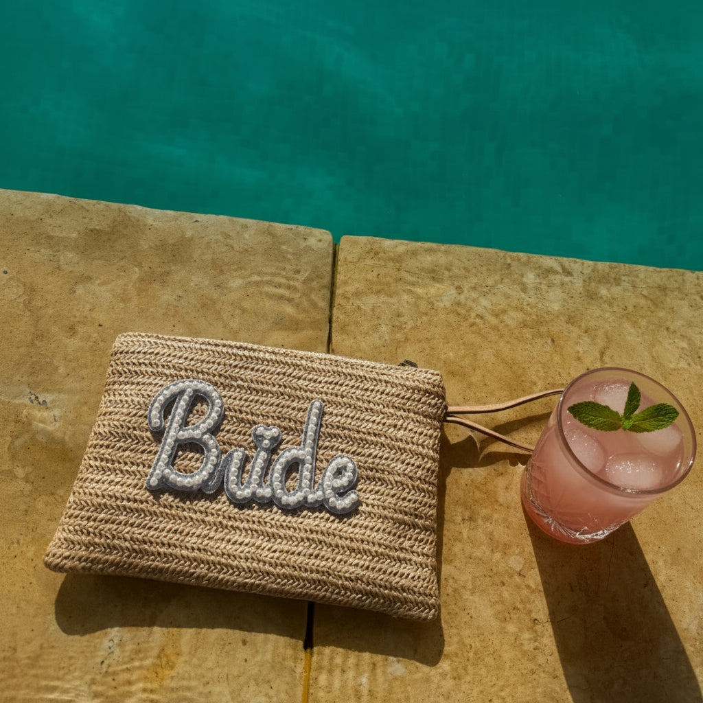 BRIDE Pearl embellished woven straw clutch
